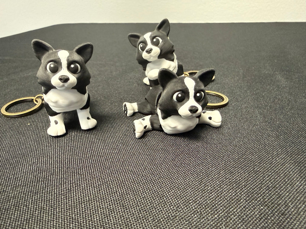 Border collie keychains in different poses