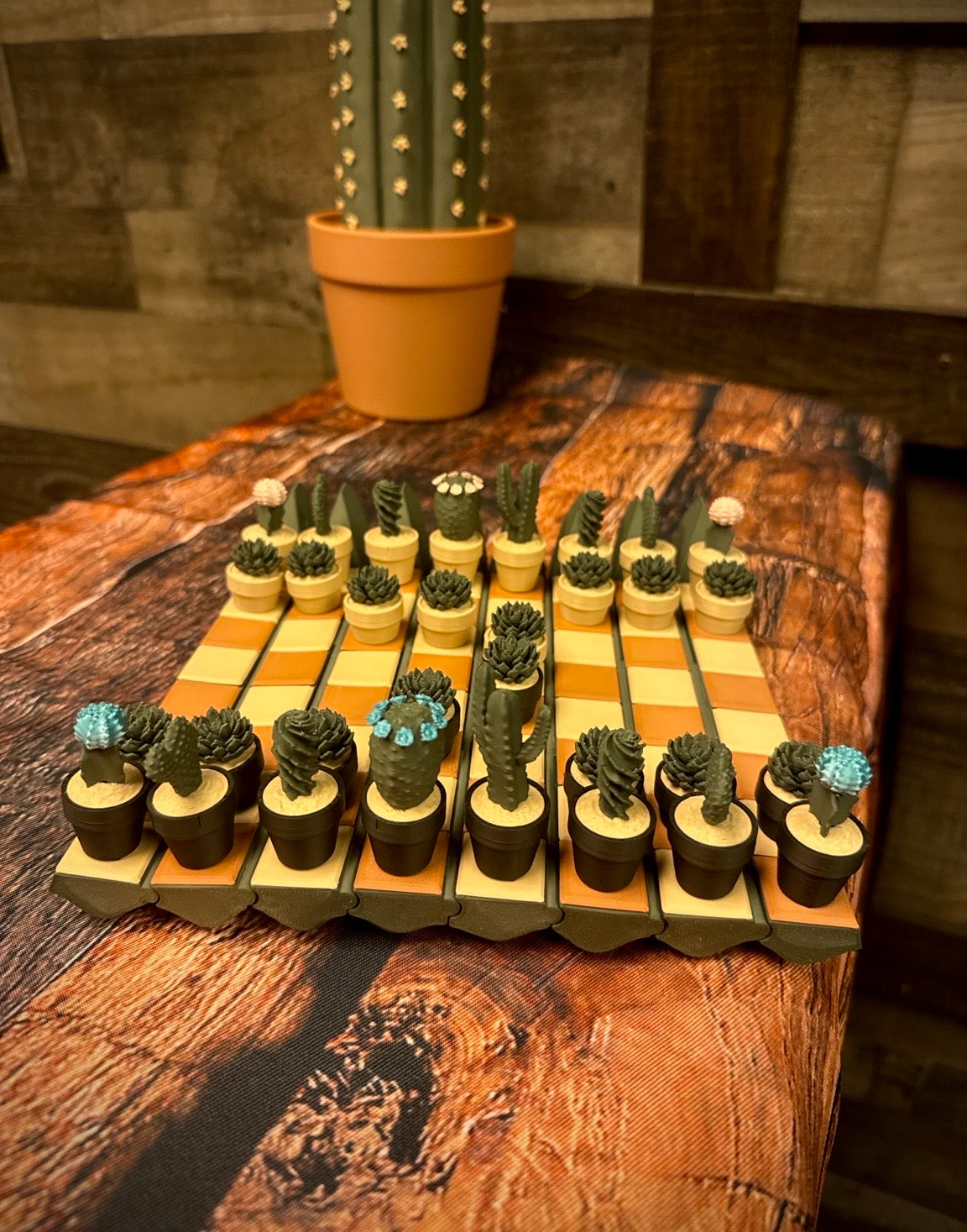 Cacti Chess with cactus-shaped pieces on a wooden table