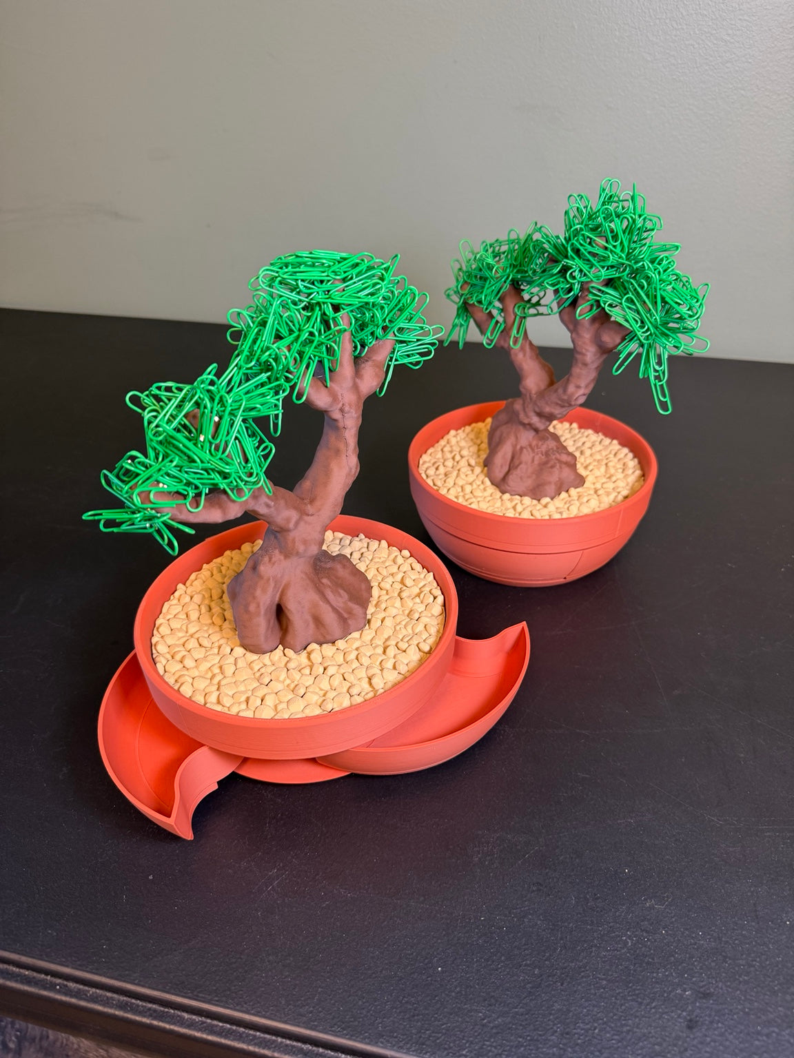 Two example bonsai organizers showing closed and open storage