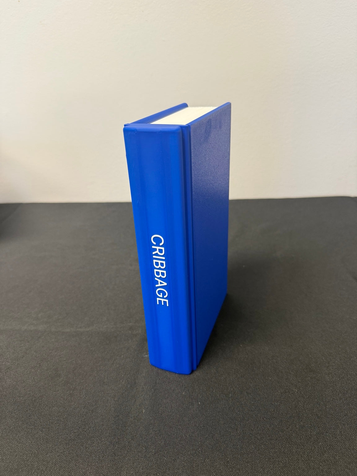 Closed blue Cribbage book case