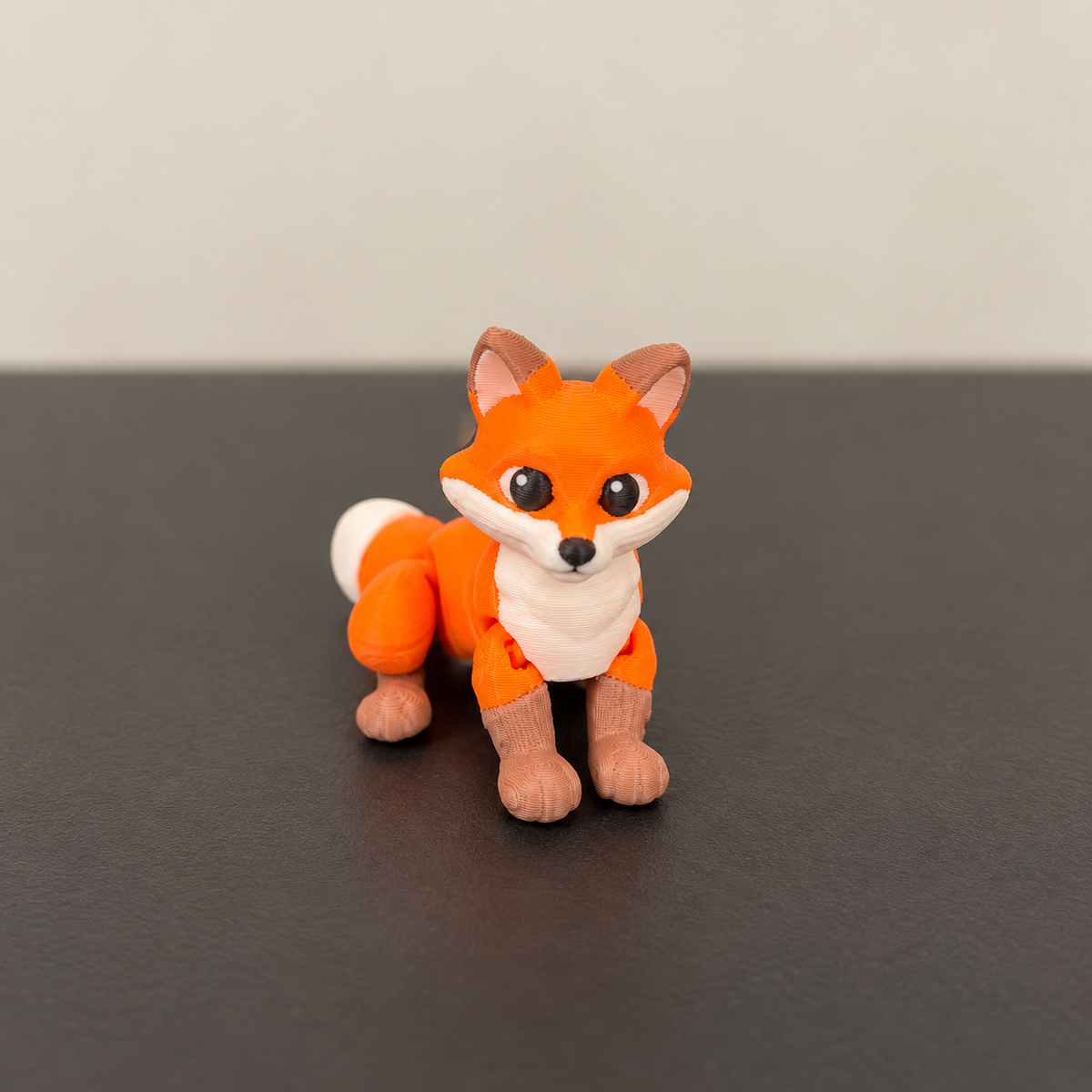 Orange and white articulated fox