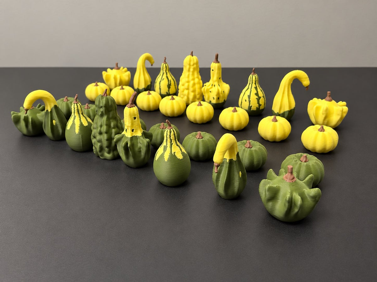 Green and yellow gourd-themed chess pieces for Gourd Games