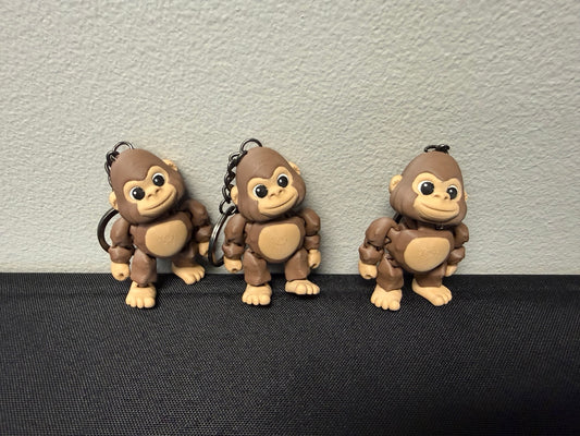 Articulated baby monkey keychains standing