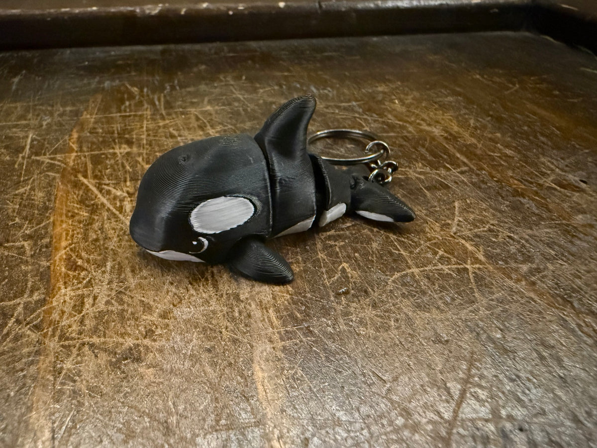 Original photograph of black and white orca keychain