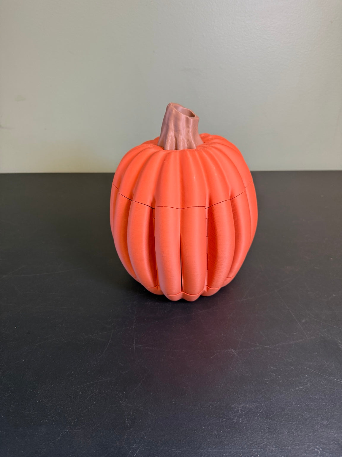 Gourd Games closed into a pumpkin for storage